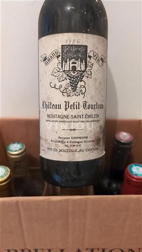 Vin Rouge sec Château Petit Tourteau 1986 France Bordeaux Montagne-saint-émilion Grand Cru